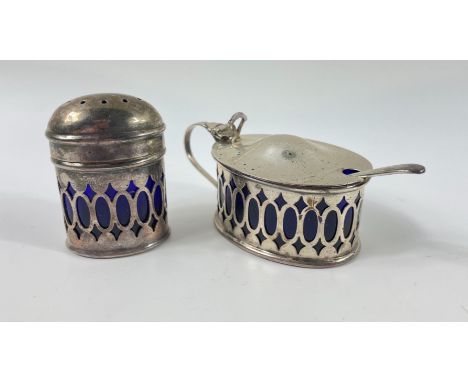 Three items of hallmarked silver CRUETS, the first two being a London 1932 mustard pot (7 x 3 x 4cm) with blue glass liner al