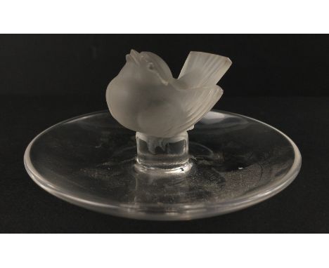 A LALIQUE ring tray with a charming Wren centre bird 10cm diameter, 5cm height, a few scratches to the base but otherwise goo