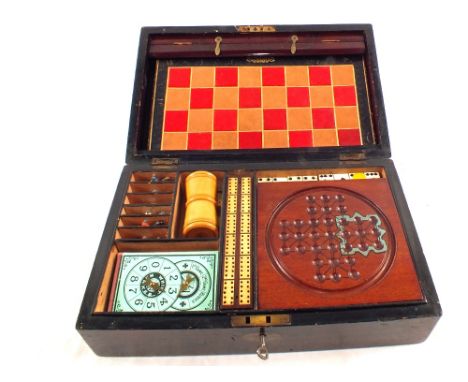A Mahogany compendium games box containing various games including dominoes, chess, draughts, crib and horse lead figures