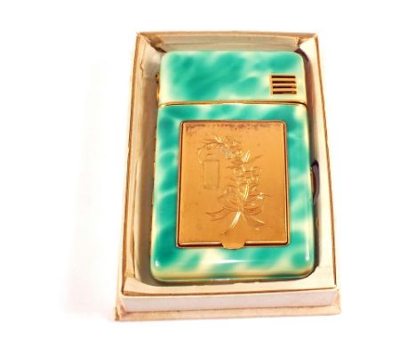 A boxed New Light green enamel combination compact