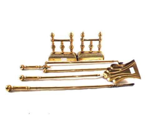 An embossed Brass log box, a set of three Brass fire irons, a pair of fire dogs, a mesh firescreen and a painted box