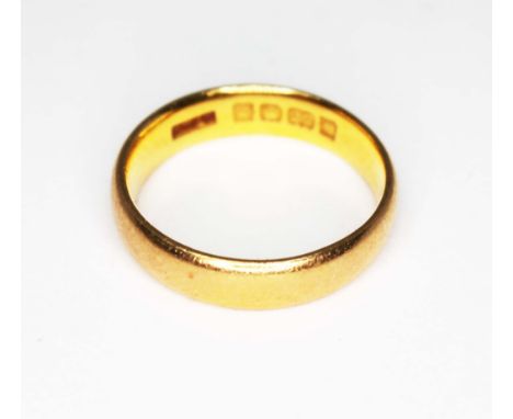 A hallmarked 22ct gold wedding band, wt. 4.4g, size J/K.  