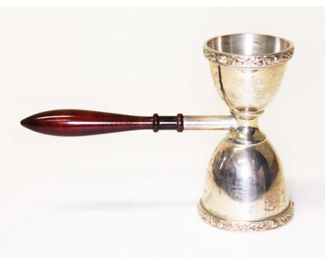 An Elizabeth II hallmarked silver double measure with turned wooden handle length 13.5cm, gross wt. 2oz.&nbsp;Condition - rub