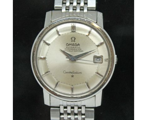 A 1967 Omega Constellation chronometer, ref. 168010, cal. 564, stainless steel case with hidden crown, straight lugs,  diam. 