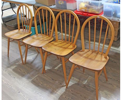 A set of four Ercol light elm and beech chairs.&nbsp;Condition - general wear including minor marks and scratches, slight pla