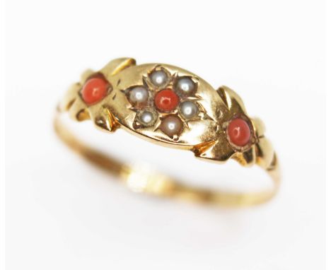A Victorian seed pearl and coral ring, hallmarked 15ct gold, Chester 1882, gross wt. 1.4g, size R.  Condition - band has been