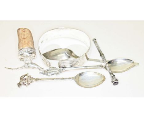 A mixed lot of hallmarked silver comprising a bangle, a cork stopper, two souvenir spoons, together with another spoon and a 