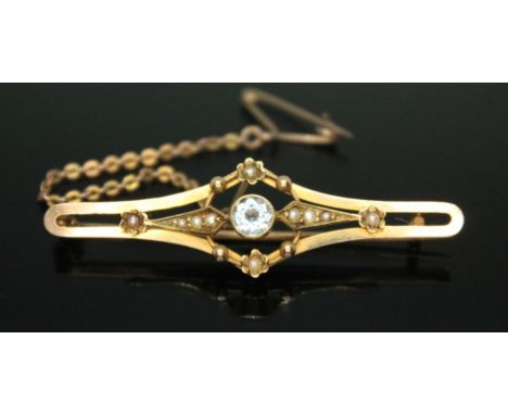 An antique aquamarine and split pearl set bar brooch, marked '15ct', length 47mm, gross wt. 3g.  