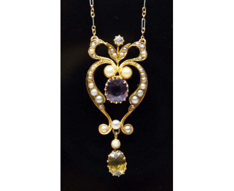 An Edwardian Art Nouveau style diamond, garnet, zircon and split pearl drop pendant, length 41mm, on 40cm two colour chain in