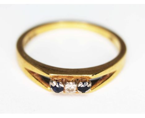 A hallmarked 18ct gold diamond and sapphire ring, gross wt. 3.1g, size N.  