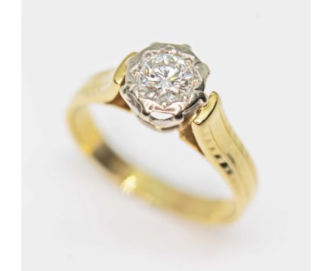 A hallmarked 18ct gold diamond solitaire ring, the round brilliant cut diamond weighing approx. 0.29ct, gross wt. 3.1g, size 