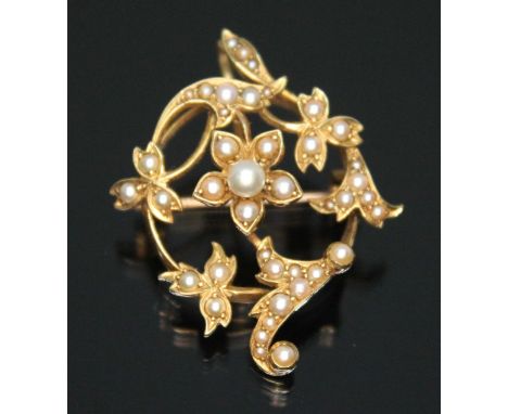 An antique pearl pendant/brooch, 34mm x 27mm, marked '15ct', gross wt. 5.5g.  Condition - good, general wear only.