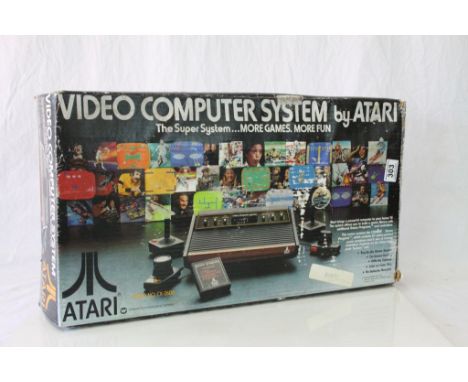 Boxed Atari Video Computer System to include console, 4 x controllers, 1 x video game, instruction documents