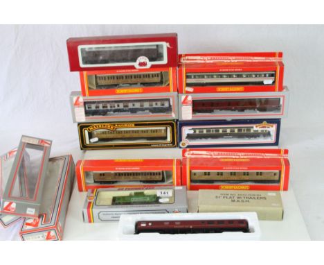 12 Boxed OO gauge items of rolling stock to include Hornby x 4, Lima x 3, Mainline x 1, Bachman x 1, Dapol x 1 AHM x 1 and a 
