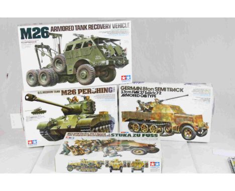 Four Tamiya 1:35 Scale model military vehicles to include No.244 M26 Armoured Tank Recovery Vehicle, No.144 German 8 Ton Semi