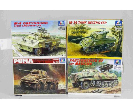 Four Italeri 1:35 Scale military vehicle model kits to include No.364 M-8 Greyhound Light Armoured Car, No.250 M-36 Tank Dest