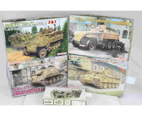 Four Dragon 1:35 Scale '39 - '45 Series model military vehicles to include No.6100 Sd.Kfz.250/1 'NEU' Armoured Personnel Carr