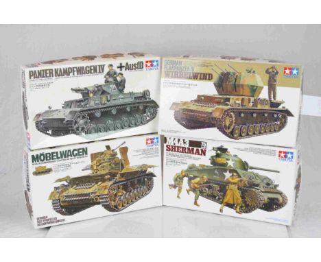 Four Tamiya 1:35 Scale model military vehicles to include No.237 Mobelwagen 3.7cm Flak auf Fgst Pz. Kpfw.IV (Sf), No.96 Panze