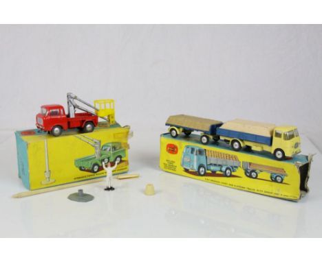 Two boxed Corgi Gift Sets to include Gift Set 11 ERF Dropside Lorry and Platform Trailer with Cement and Plank Loads in pale 