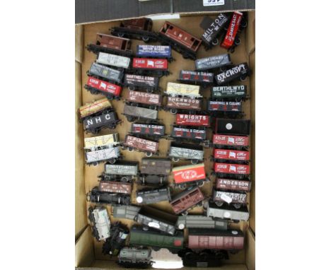 Collection of 50 OO gauge items of rolling stock, all wagons and trucks to include Dapol, Bachmann, Mainline etc