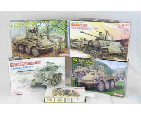 Four Dragon 1:35 Scale '39 - '45 Series model military vehicles to include No.6256 Sd.Kfz.234/2 Puma, No.6083 M4A1 (76mm)W Op