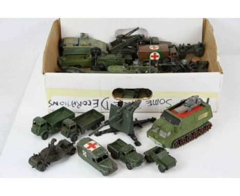 24 Play worn diecast military models to include mainly Dinky examples featuring 688 Field Artillery Tractor, 660 Tank Transpo