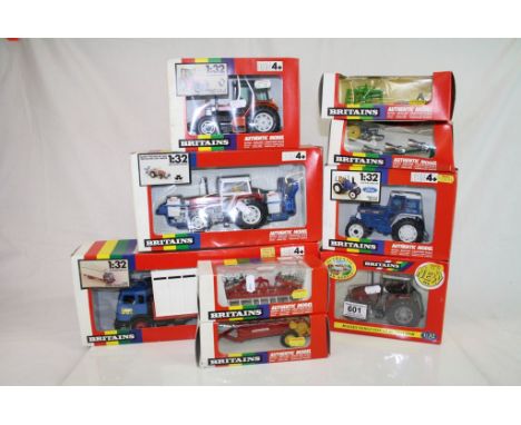 Nine boxed 1:32 Britains farming vehicles to include 9527 Ford 5610 Tractor, 9518 Renault TX 14514 Turbo Tractor, 09449 Masse