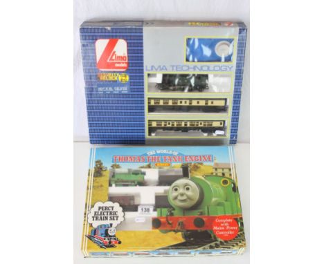 Two boxed OO gauge electric train sets to include Hornby R182 Thomas the Tank Engine Perect train set (contains only Percy lo