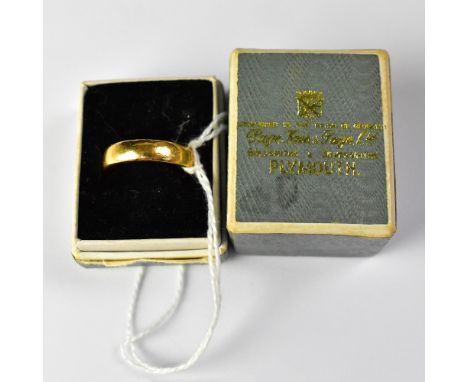 A 22ct gold band ring with five star inset tiny diamond chips, size K, approx 4.4g.