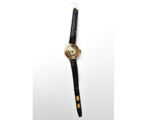 ROLEX; a 9ct rose gold wristwatch, the silvered dial chapter ring set with Arabic numerals and engraved central panel, the ca