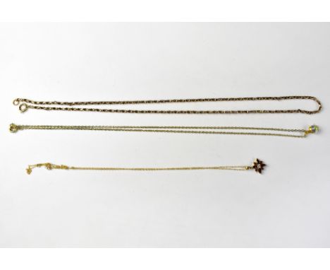 A 9ct gold chain link necklace, together with a 9ct gold pendant in the form of a flower head, set with central diamond among