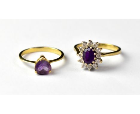 A 9ct gold dress ring with an oval purple stone within a border of white stones, size Q, approx 3.3g, together with a 9ct gol