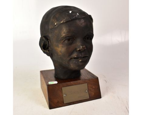 SAMUEL TONKISS; plaster bust of 'Nigel', dated 'Jan 1960', mounted on a wooden base with a plaque, height 28cm.