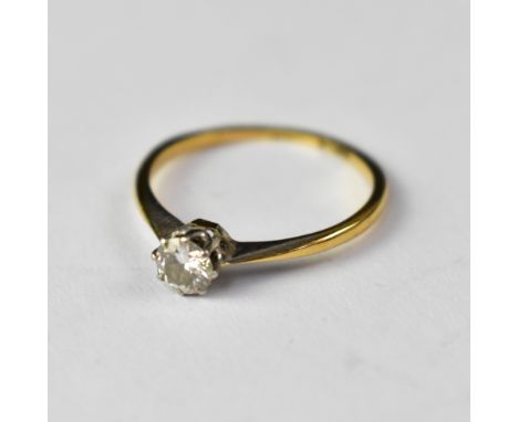 An 18ct gold diamond solitaire ring, the diamond approx 0.3ct, size K, approx 1.3g.