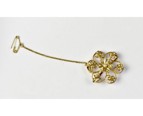 An Edwardian 9ct gold open floral brooch with tiny seed pearls to the flowers and leaves, with safety chain, diameter 3cm, ap