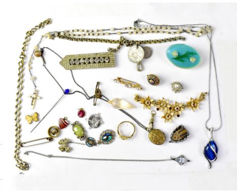 A quantity of jewellery to include a watch chain, etc.