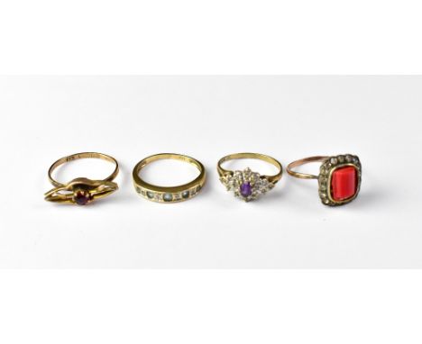Four 9ct gold rings, comprising a Victorian example with central red faceted stone within a border of small white stones, on 