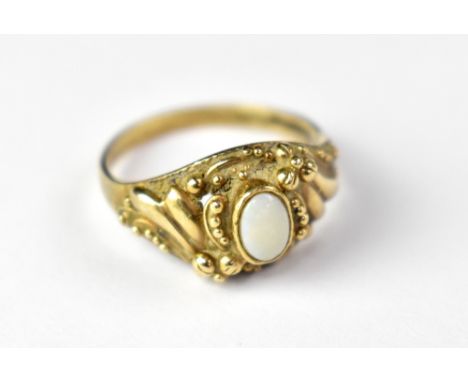 A 9ct gold opal ring, the Victorian-style setting with a small white opal (lacking colour), size Q, approx 3.2g.