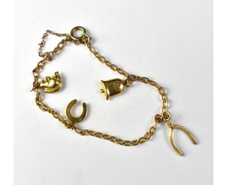 A 9ct gold dainty charm bracelet with four charms, comprising wishbone, horseshoe, bell and squirrel, with hoop clasp and saf