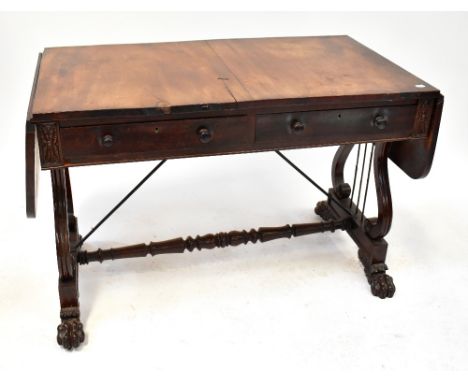 A Regency mahogany sofa table with twin D-end flaps, above a pair of frieze drawers, with pair of faux drawer fronts opposite