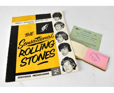 ROLLING STONES; a small autograph book containing the signatures of Keith Richards, Mick Jagger and Brian Jones, amongst othe