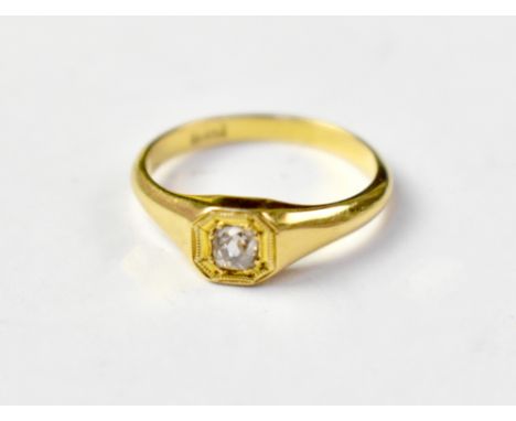 An 18ct gold ring with a square mount set with a small diamond chip, size N, approx 3g.