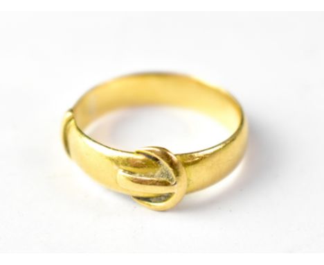 A late 19th/early 20th century 22ct gold buckle ring, size O, approx 5g.