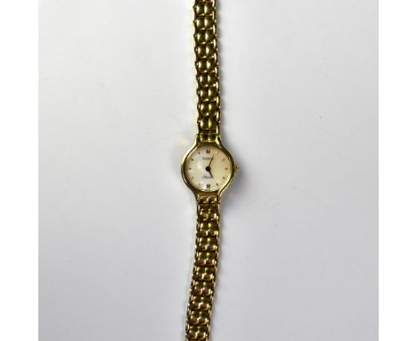 TISSOT; a ladies' 9ct gold wristwatch, the pearlescent dial set with raised gold baton numerals, quartz movement, in a 9ct go