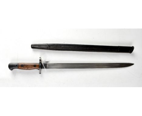 A British 1907 pattern sword bayonet with leather scabbard, blade length 44.5cm, overall length 57cm.