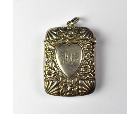 A Victorian silver vesta case, with a heart-shaped panel depicting the veiled bust of Queen Victoria to one side and a heart-