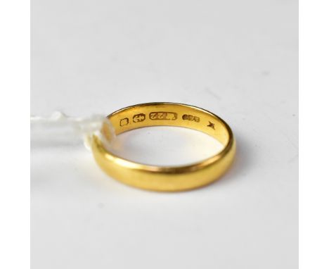 A 22ct gold band ring, size R, approx 4.5g. CONDITION REPORT: Overall good condition. Some age-related surface scratches. No 