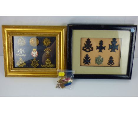 Two framed displays of various military cap badges, to include National Defence Company, Egypt, Lancers, Royal Artillery, Fir