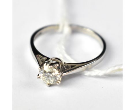 An 18ct white gold solitaire ring, the claw set brilliant cut diamond approx 0.5ct, size P, approx 2.75g. CONDITION REPORT: 0