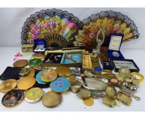 A quantity of various collectibles to include vesta cases, McIntosh-style hip flask, napkin ring, compacts, vanity items, wat